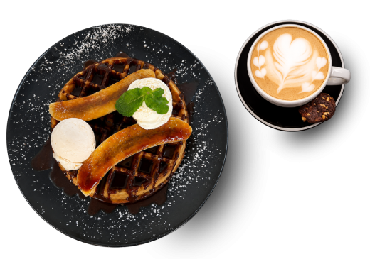 Banana waffle dessert and coffee at L'Opera Knysna